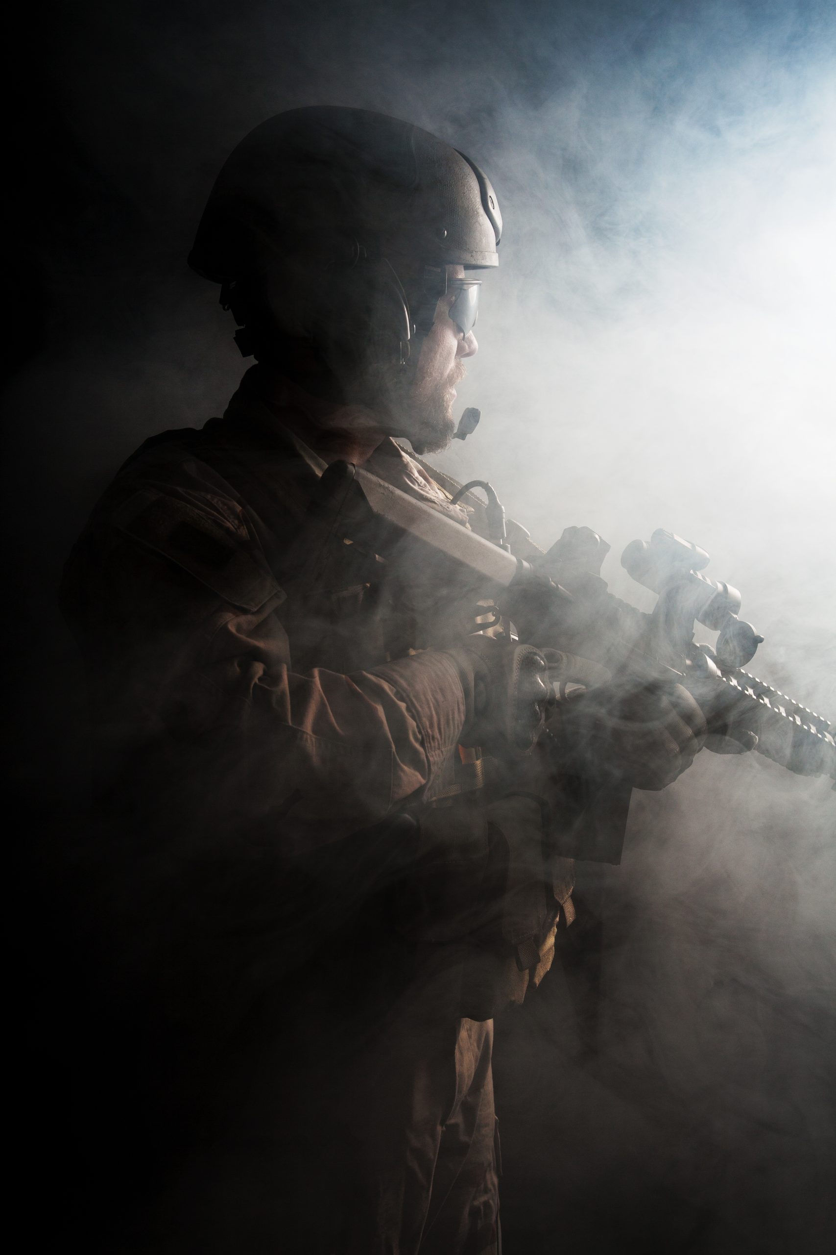 Bearded special forces soldier on dark background